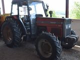 a tractor that is parked in a building