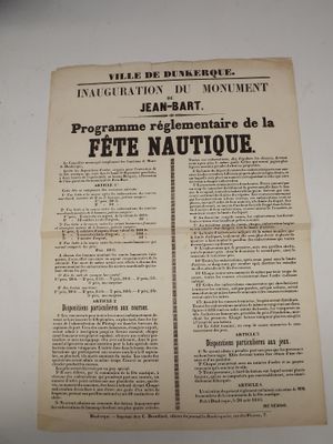 an old french newspaper with a black and white image of a cat