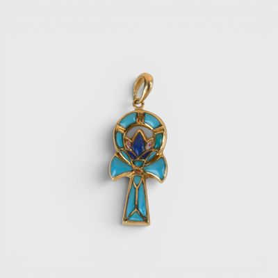 un pendentif égyptien en forme de croix, en or et émail