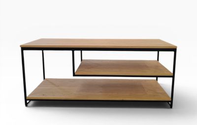 a coffee table with three shelves on top of it
