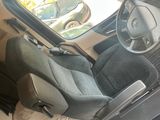 a picture of a car with a seat and steering wheel