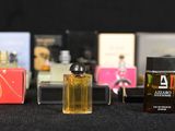 a lot of perfume bottles that are on a table