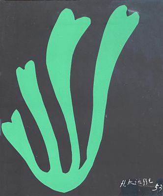 un panneau noir orné d'une fleur verte
