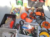 many tools that are sitting on the floor next to each other