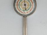 a clock that is hanging on the wall on the wall