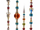 a set of three christmas ornaments hanging from a string