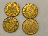 four gold sovereigns from the british empire