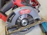 a picture of a circular saw on a table in a workshop