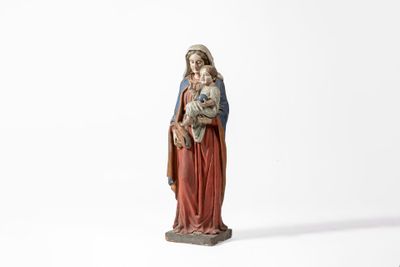 statue of a woman holding a child in her arms