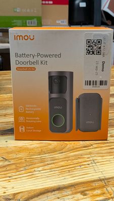 une boîte contenant un kit de sonnette à piles