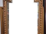 a mirror that is sitting on a table next to a mirror