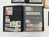 a lot of stamps on the cover of a book