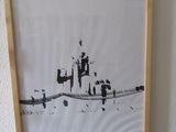 une photo d'une photo d'une ville accrochée au mur