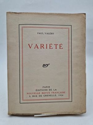 a close up of a book on a table with a white background