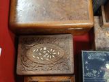 a red box filled with assorted wooden items