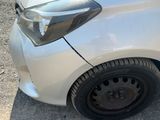 a close up of a car that has a denting on it