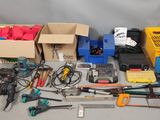a lot of tools that are sitting on a table