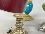 two lamps that are sitting next to each other on a table