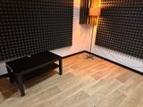 a room with a table and a chair in it