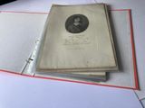 a book with a picture of a man on it sitting on top of a table