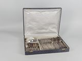 silver plated flatware in a case with silverware in it