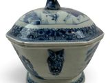 a blue and white bowl with an owl on it