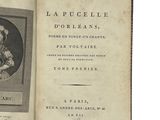 an old book with a picture of a woman in a dress