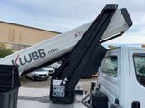 a white truck with a crane on the back of it