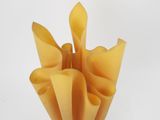 a piece of cheese that has been cut into pieces
