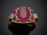 une bague ovale sertie de rubis, de saphirs et de diamants