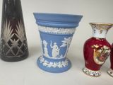 three vases sitting next to each other on a table