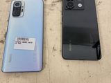 two samsung galaxy s9 and s9e are next to each other