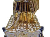 statue of a man dressed in armor holding a sword and shield
