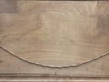 a piece of wood with a rope on top of it