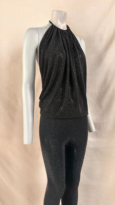 a mannequin wearing a black top and leggings on a mannequin mannequin