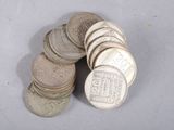 a pile of coins sitting on top of a table