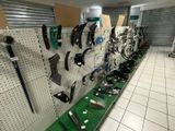 many different tools on the wall in the store