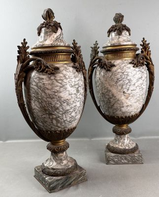 pair of antique silver and marble urns on marble bases