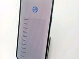 an iphone with the screen showing the location of the world on the screen