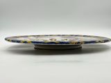 an image of a plate with a blue and gold design on it
