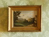 une image d'un tableau accroché au mur d'une pièce