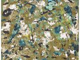 une peinture abstraite réalisée à la peinture verte et bleue sur fond blanc