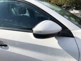 a close up of a car ' s side mirror on the side of the car