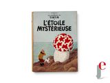 an old book with a picture of a mushroom on the cover