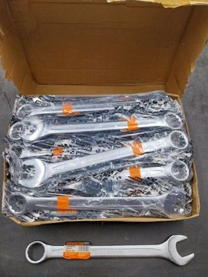 a box full of tools that are sitting on the floor