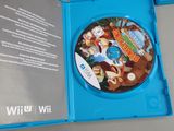 nintendo wii wii game in a blue case on a table