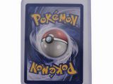 the card is in a plastic case with a pokemon logo on it