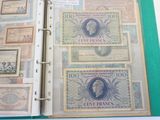 a binder with a lot of different notes on it