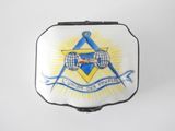 wallet case with a masonic symbol on it and a ribbon