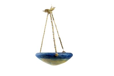 blue and yellow ceramic hanging planter with a gold star on top